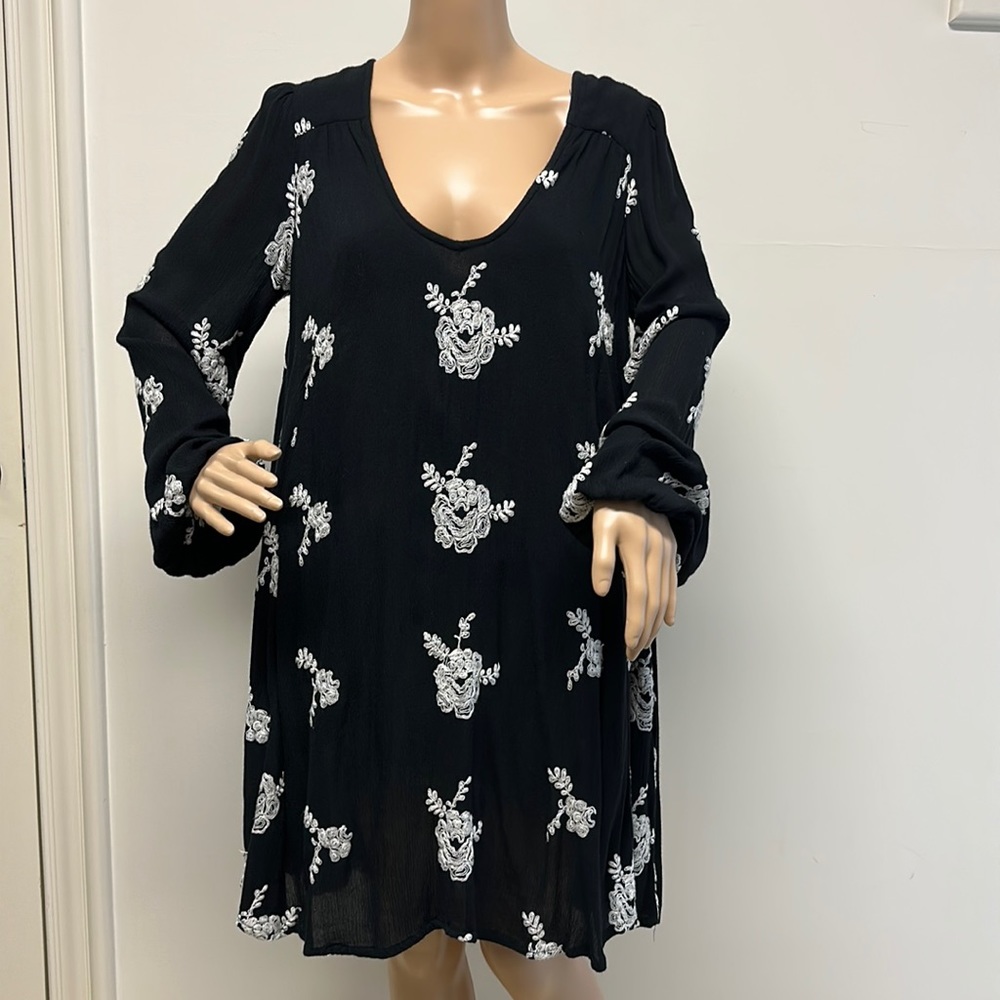 Free People Black mini dress with white embroidered rosette’s open back size M